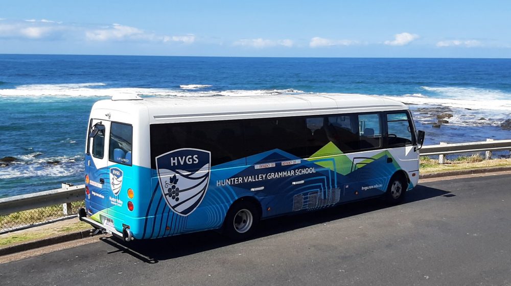 bus positioned by the ocean