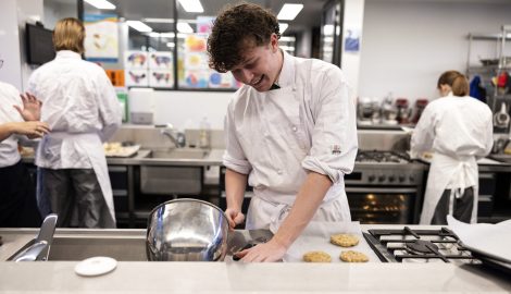 student cooking a kitchen